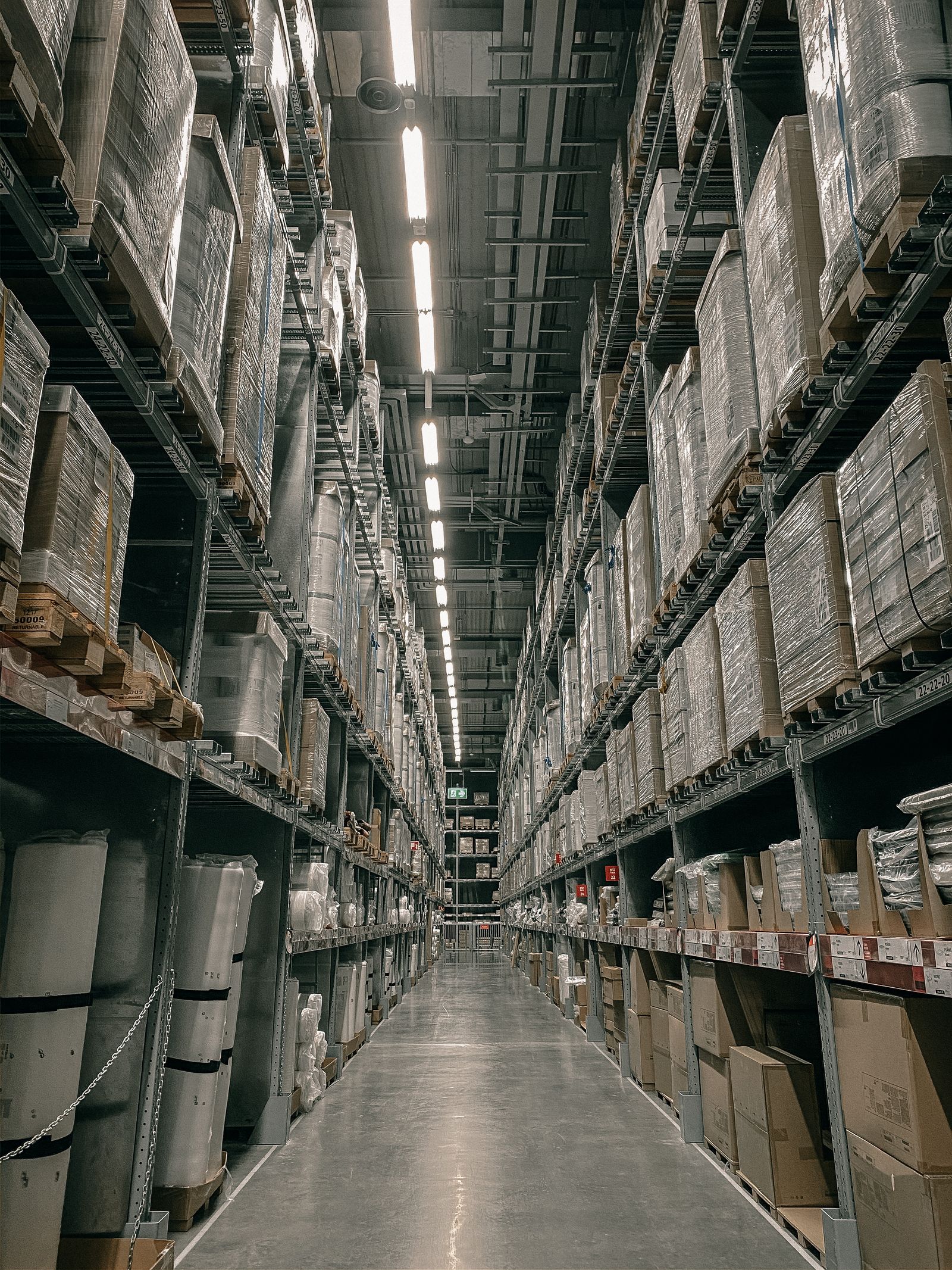 Orderly warehouse aisle used as an editorial context image